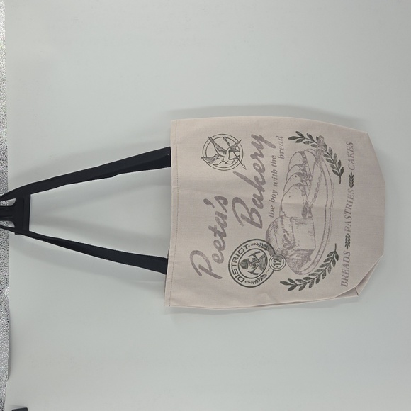 The Hunger Games Peeta's Bakery Cream Tote Bag - Picture 14 of 16